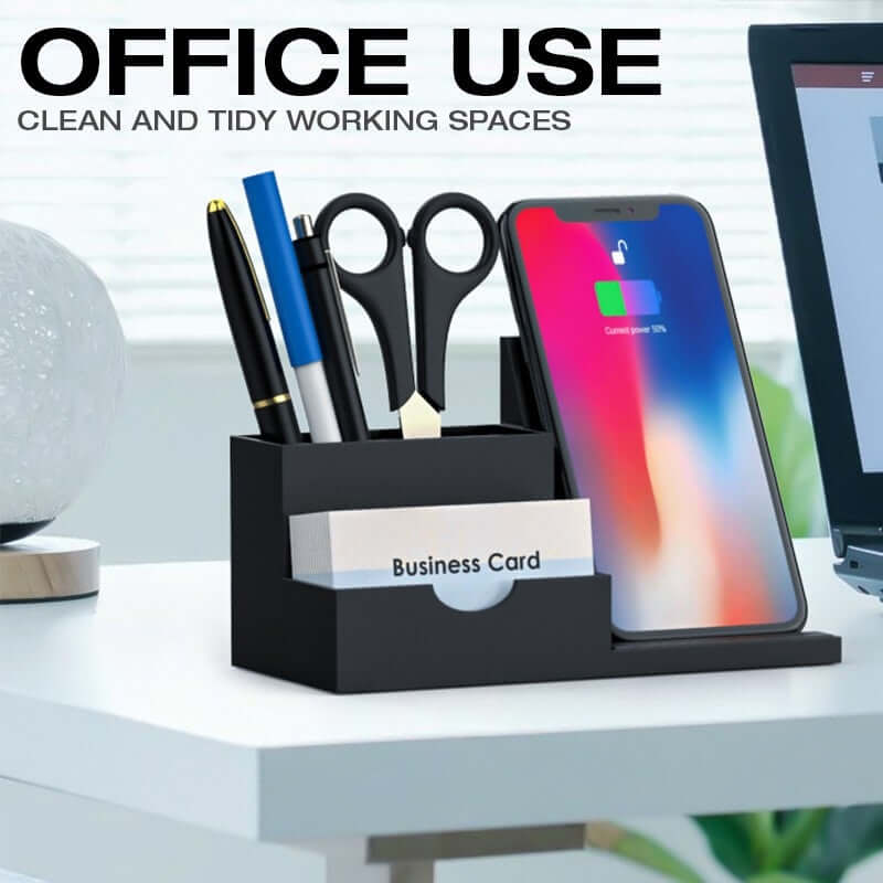 Wireless charging pen holder on an office desk with phone, pens, scissors and business cards