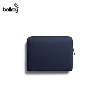 Rear view of a navy Bellroy Laptop Caddy with zip closure.