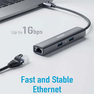 Anker USB-C hub beside an Ethernet cable with a gigabit-network illustration
