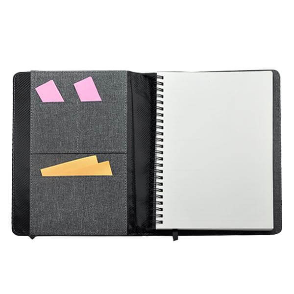 Open grey A5 notebook with internal card pockets holding coloured cards and a wire-bound insert.