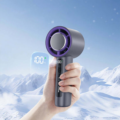 Valore cooling fan held in one hand, with a decorative snowy background and enlarged display graphic
