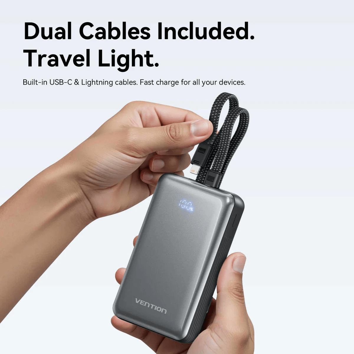Vention 20000mAh Power Bank with Built-in Cables 35W in hand, showing dual USB-C and Lightning cables.