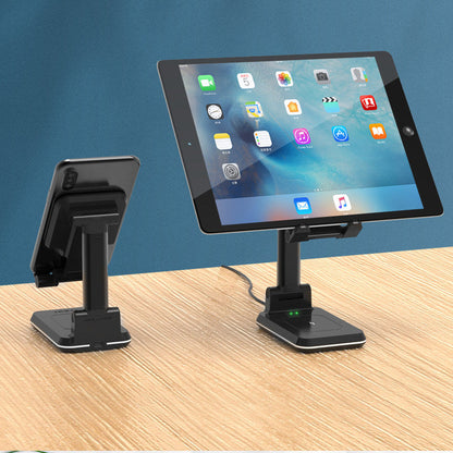 Black stand shown supporting a demonstration phone and a landscape tablet on a desk