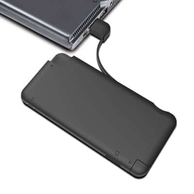 BrandCharger iQ+ powerbank connected by cable to a laptop