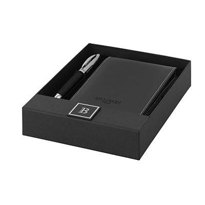 Balmain black pocket notebook and matching ballpoint pen in a presentation gift box.