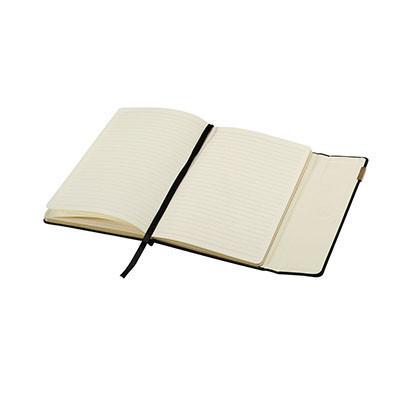 Open Balmain notebook showing cream lined pages, black ribbon marker and closure flap.
