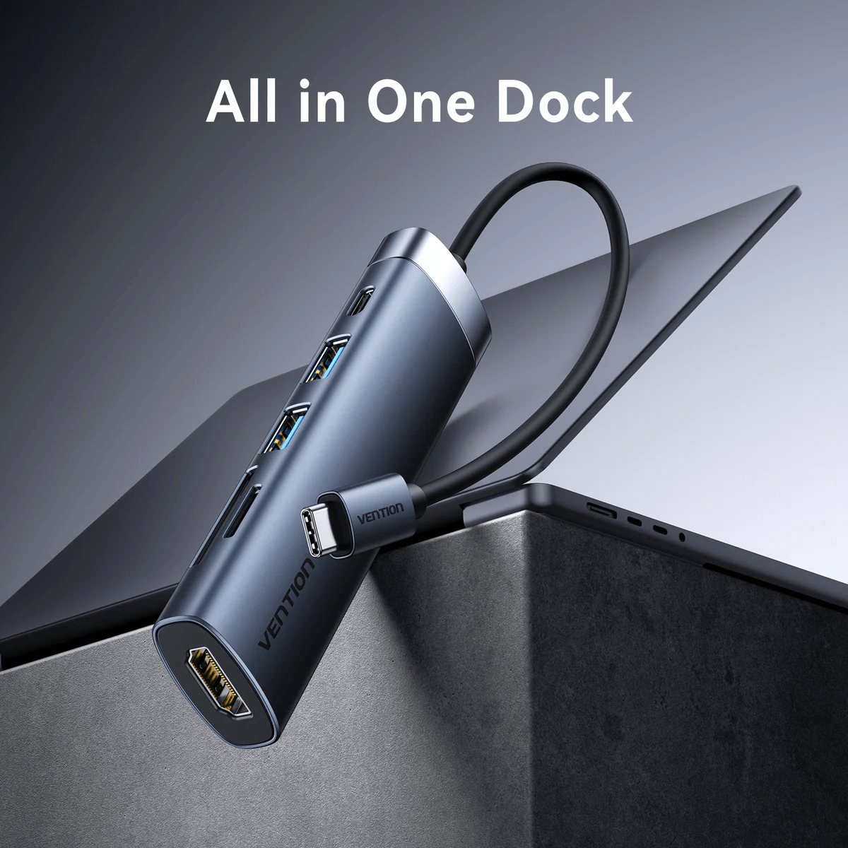 Vention 6-in-1 USB-C Docking Station with HDMI connected to a laptop, showcasing all-in-one functionality.