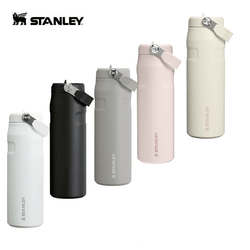 STANLEY The IceFlow™ Bottle with Flip Straw Lid 710ml in various colors including white, black, gray, pink, and cream.