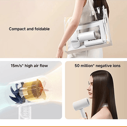 Xiaomi Compact Hair Dryer H101 shown in use with high air flow and negative ions technology, perfect for travel.