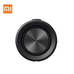 Xiaomi Bluetooth Speaker top view showcasing its sleek design and powerful sound quality.