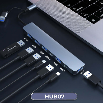 Seven-port USB hub beside a laptop with USB-A and USB-C device connections illustrated.