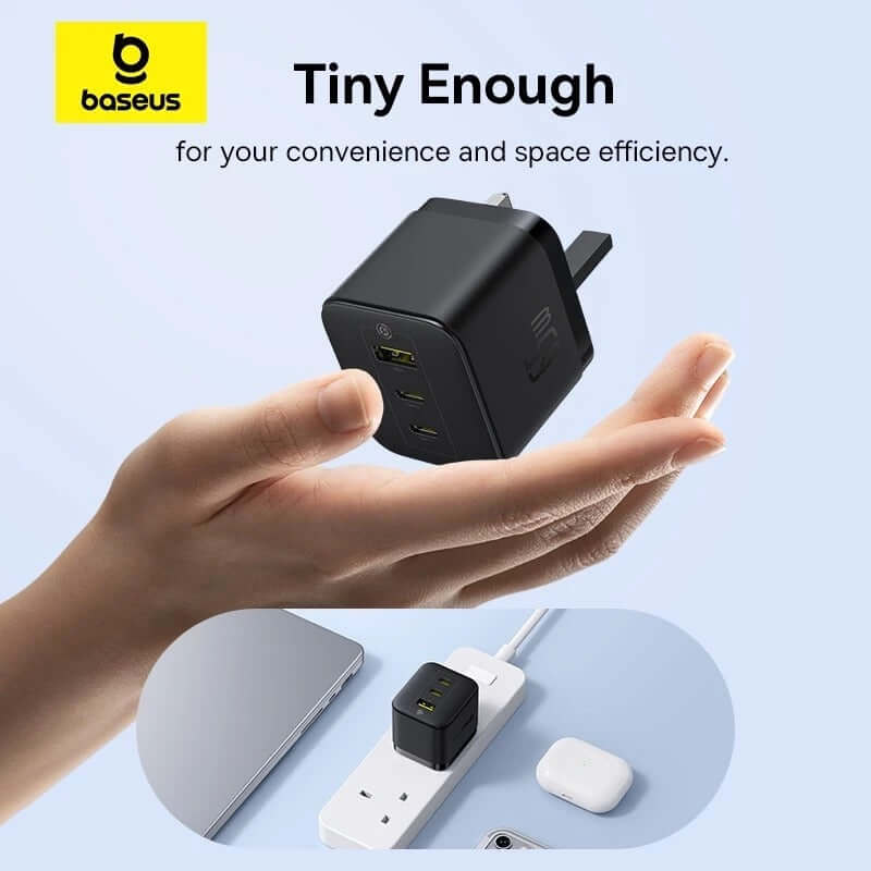 Baseus Palm Fast Charge 65W compact charger in hand, perfect corporate gift for modern devices.