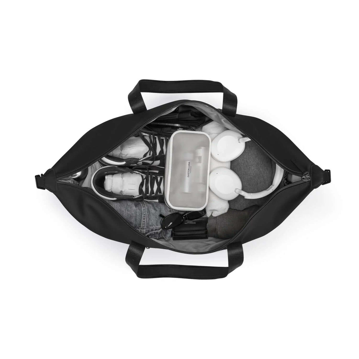 Interior view of the Gaston Luga Dash Weekender 2.0 Large bag showing organized items for travel.