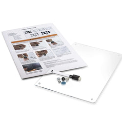 Magnetic Fridge Planner components including clear acrylic surface, dry-erase marker, and accessories for planning.