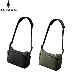 ALPAKA Flight Satchel Sling Bag in black and green, perfect for corporate gift and modern travel.